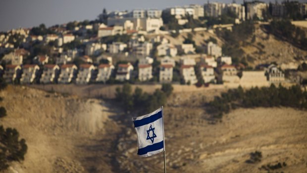 The flag of Israel flies near the settlement of Maaleh Adumim in the Israeli-occupied West Bank.