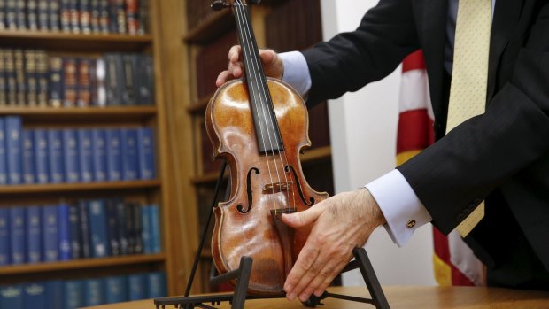 The Ames Stradivarius violin is placed for viewing in New York  on Friday.