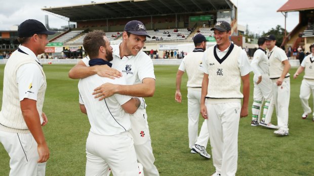Victoria's players celebrate after winning the Sheffield Shield final against South Australia.