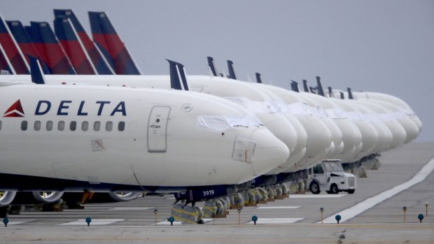 Mothballed Delta Air Lines jets at Kansas City International Airport last year. Domestic travel has now bounced back for the airline.
