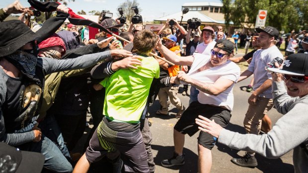 Members of  Reclaim Australia and supporters of No Room For Racism clash.