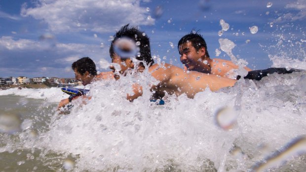 Swimmers cool off at Bondi on Tuesday afternoon, as temperatures remained at 30 degrees in parts of the city.