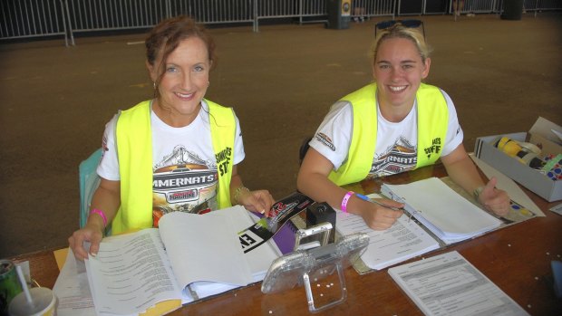 Summernats scrutineering team members Rhiannon Sharp and Olivia Fripp from Wollongong worked hard to process the 2000 cars expected to take part.
