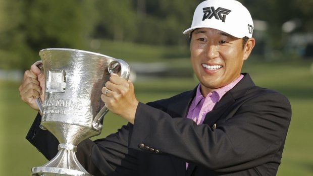 James Hahn poses with the trophy.