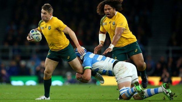 Breakaway: Drew Mitchell's late run sealed the game for Australia.