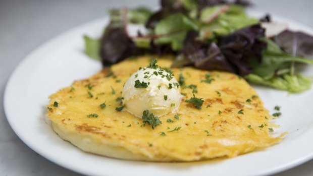 Cheese and potato pancake with a good old-fashioned scoop of butter.