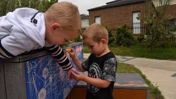 William Bray and Taj Swan play at the sensory play space at Lindrum Reserve in Belrose.