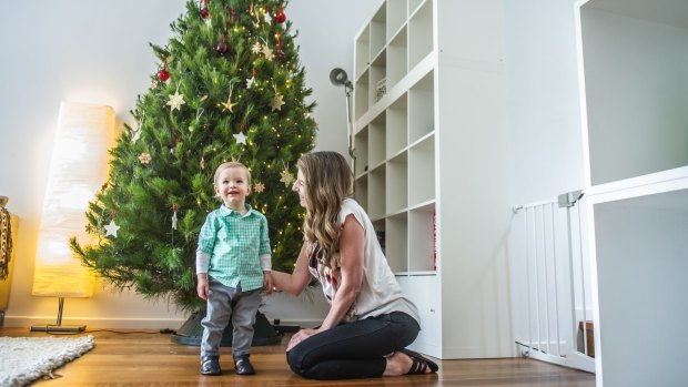 Sandra Feletti with 14-month-old son Marco Reed. It's just not Christmas for Sandra unless she has a real tree.