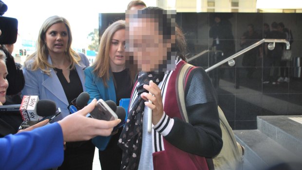 A Perth woman charged with flying overseas and leaving her young children alone at home has appeared in court.