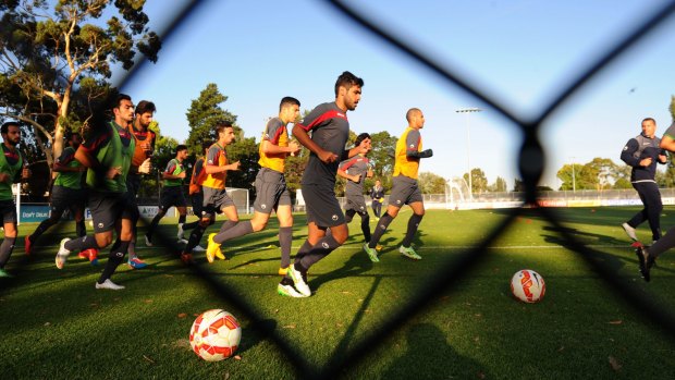 Kuwaiti players train before their match against Australia.