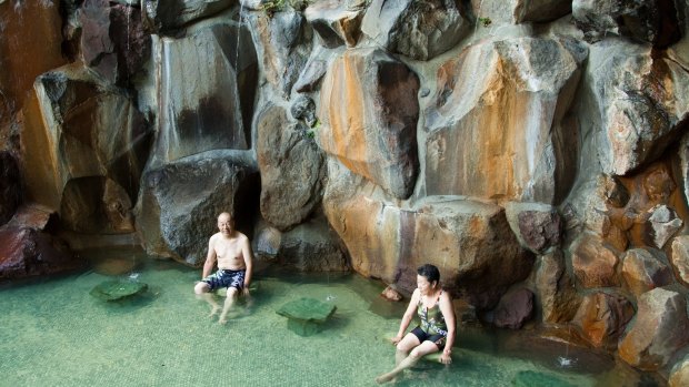Waterfall massage: Kowakien Yunessun, a hot springs spa resort and water amusement park near Hakone.
