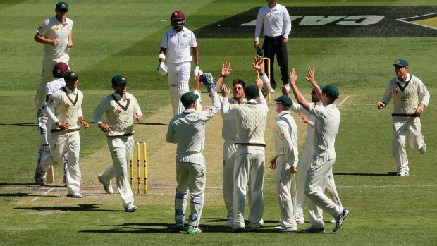 James Pattinson is congratulated after getting the wicket of Marlon Samuels on day two of the Second Test match between Australia and the West Indies at the MCG on Sunday.