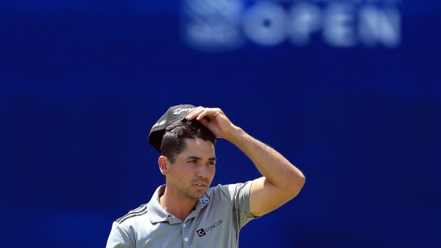 Struggling for consistency: Jason Day reacts to his eagle putt on the 18th hole during the third round of the Canadian Open at Glen Abbey Golf Club.