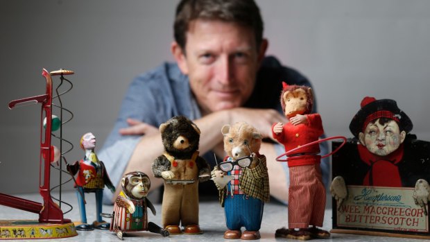 Solicitor Andrew McGregor and some of his vintage tin toys.