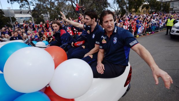 Luke Beveridge shared the joy of the parade with his players.