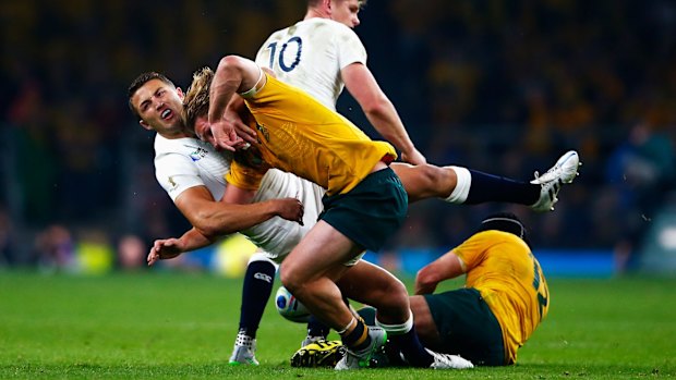 Sam Burgess catches Michael Hooper in the World Cup pool game.