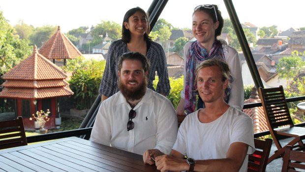 Australian students (clockwise from back left) Bridget Harilaou, Rebecca Lawrence, Harrison Hall and Thomas Brown are studying in Indonesia under the New Colombo Plan.