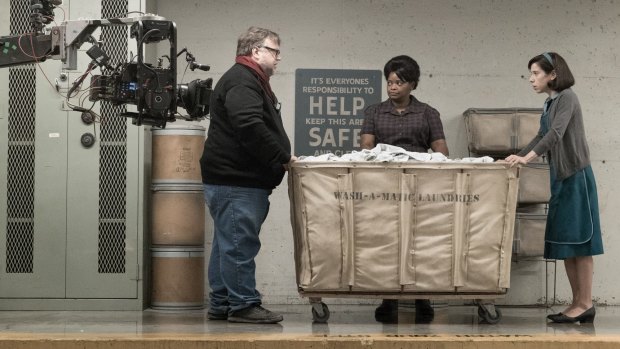 Director Guillermo del Toro (left), Spencer and Hawkins, on the set of <i>The Shape of Water</I>, which is heading full-tilt for the Oscars.