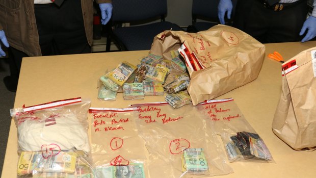 Some of the more than $300,000 cash found by police.
