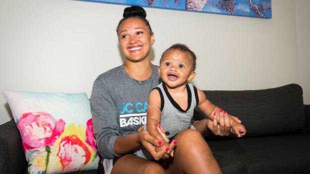 Capitals import Mistie Bass and her son Braven Boyd donated baby clothes and toys to Karinya House before returning home to the United States.