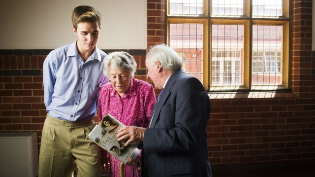 Canberra Grammar Eddison House Year 11 student Thomas Hart, With Pamela Yonge (sister of Pete, Jack, and Tom Eddison) with author of 'For love of country', Anthony Hill.