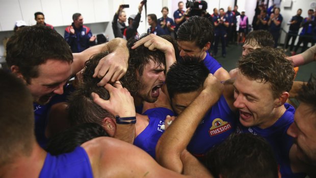 Celebration: The form that had the Bulldogs winning against the Sydney Swans could also see them into the finals.
