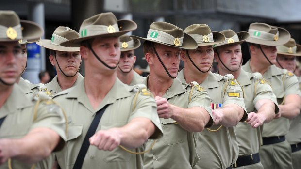 Infantry soldiers march during the Anzac Day march in Brisbane.