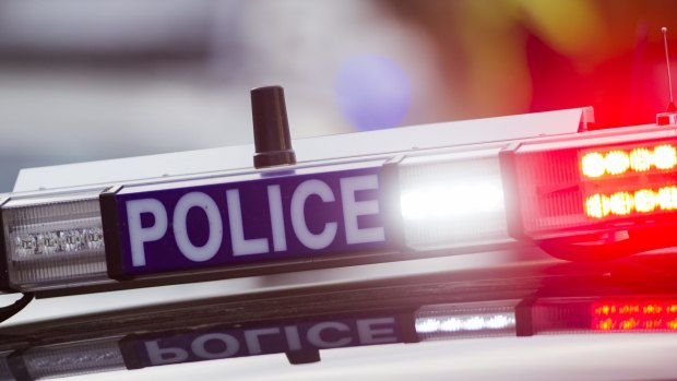 Police arrested a man on the virtue of a warrant at the Canberra Centre on Tuesday morning. 