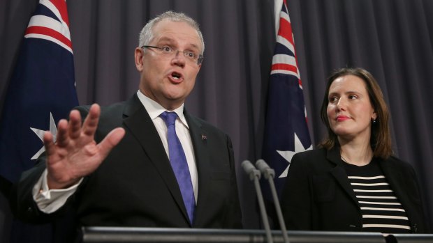 Treasurer Scott Morrison and Minister for Revenue and Financial Services Kelly O'Dwyer address the media during a press conference at Parliament House on Thursday.