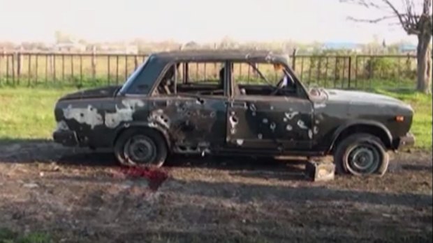 Blood can be seen next to this destroyed car after heavy fighting erupted in Terter, Azerbaijan.