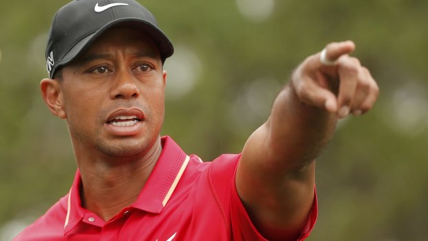Red credentials: Tiger Woods' favourite colour or the final round of tournaments.