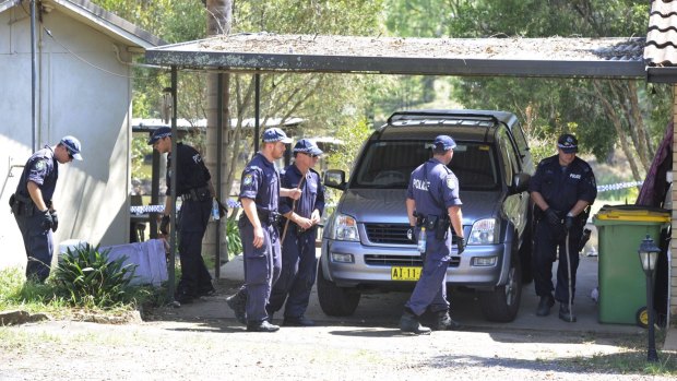 Police conduct a search of the property in Oakville, north-west Sydney, where Inspector Bryson Anderson was fatally stabbed in December 2012.