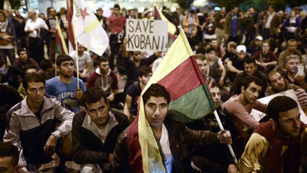 Kurds living in Greece protest in central Athens over the plight of Kobane.