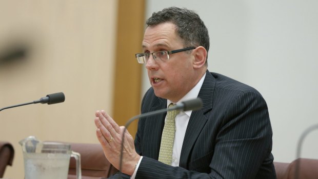 Outgoing Solicitor-General Justin Gleeson during a public hearing at Parliament House.