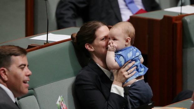 Labor MP Kate Ellis with 4-month-old Charlie during a division in the House of Representatives on Monday.