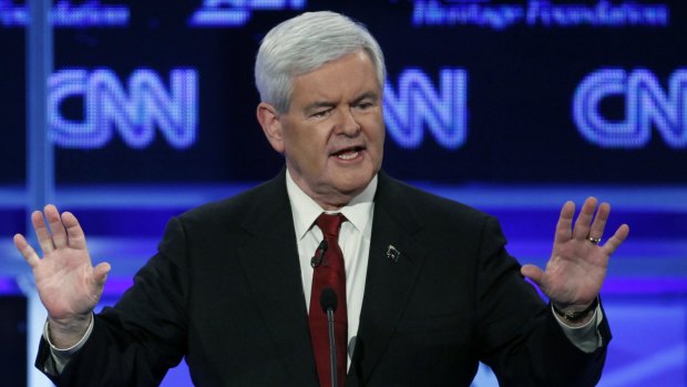 Then presidential candidate Newt Gingrich speaks during the Republican presidential debate in Washington in 2011.