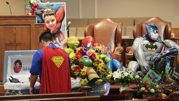 Dale Hall attended his brother Jacob's funeral as Superman at Oakdale Baptist Church in Townville, South Carolina, on Wednesday.