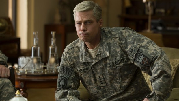 Brad Pitt delivers an over-the-top comedic performance as a military man consumed by his own ego in <i>War Machine</i>.
