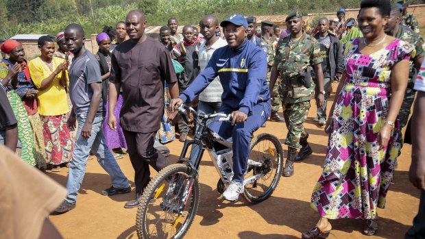 President Pierre Nkurunziza rides  to cast his vote in the presidential election.