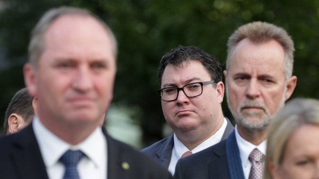 George Christensen with Deputy Prime Minister Barnaby Joyce with National MPs and Senators at Parliament House in Canberra on Thursday.