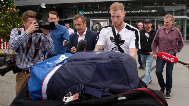 New Zealand-born England cricket star Ben Stokes is surrounded by media as he arrives in Christchurch.