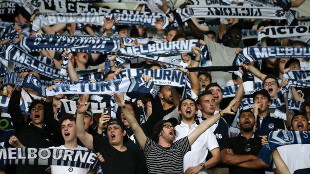 True blue: Victory fans received some early Christmas cheer after a narrow win over their fiercest rivals City.