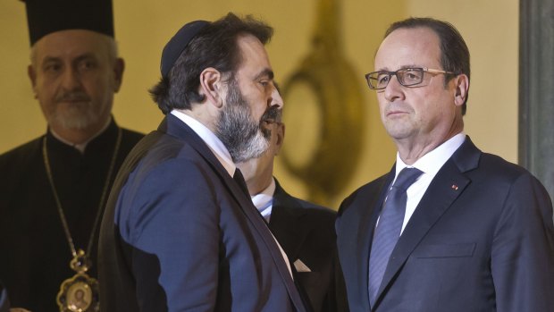 French Jewish Consistory president Joel Mergui, with French President Francois Hollande after a meeting with religious leaders in Paris on Wednesday. 
