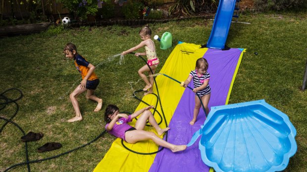 Slides, pools and a hose: more than enough entertainment for a summers day. 