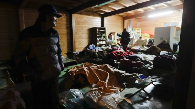 Residents prepare to spend the night in makeshift shelters in the town of Visso in central Italy.
