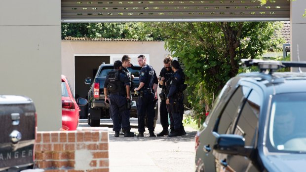 Police carry out a firearm prohibition order raid at the home of Mustapha Dib on December 1, 2016.