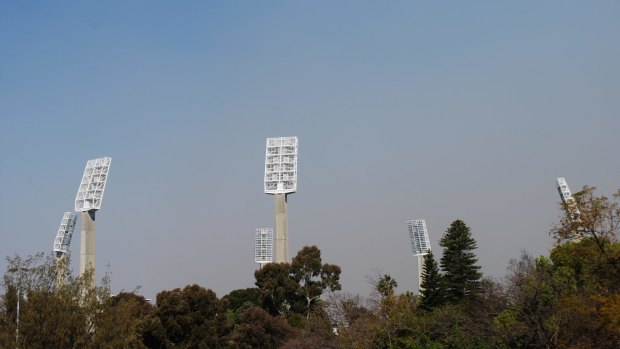 Blue skies and smoke above the WACA in East Perth.