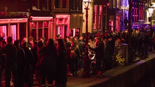 Tours of the red-light district still will be allowed if guides stick to the new restriction, which takes effect in April, and keep the windows off their itineraries.