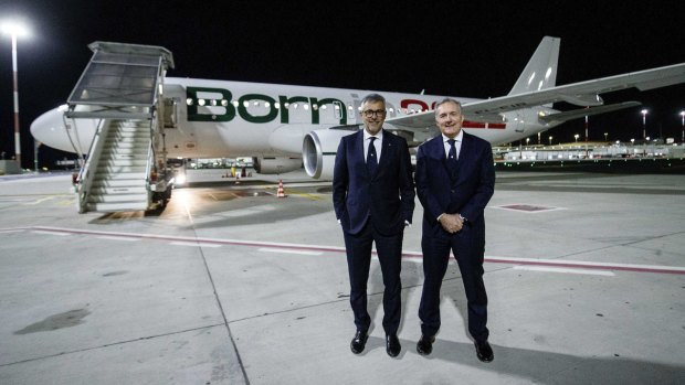 Fabio Lazzerini, left, CEO of new national carrier ITA, poses with President Alfredo Altavilla on the tarmac in Rome last Friday at the official launch of the airline.