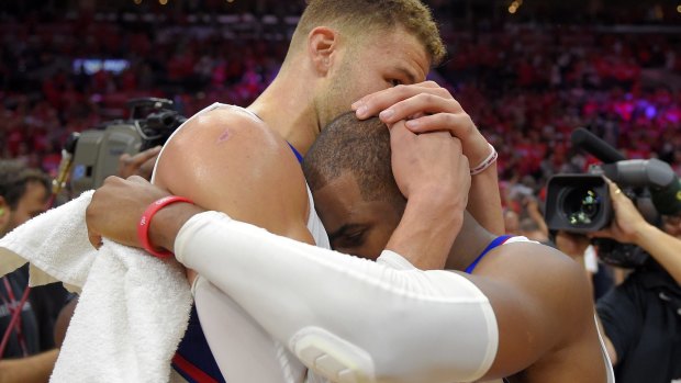 Los Angeles Clippers forward Blake Griffin, left, hugs guard Chris Paul after they defeated the San Antonio Spurs in game 7 in a first-round NBA basketball playoff series on Sunday. 